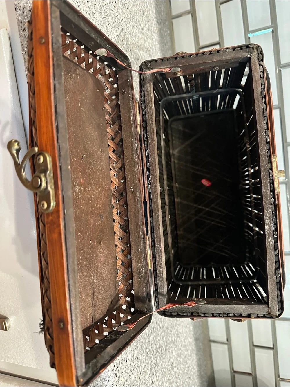 Woven bamboo storage box. All bamboo with metal latch closure.